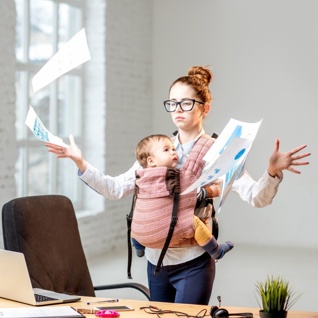 young mom working with baby